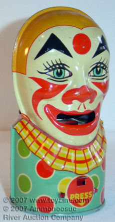 tin toy clown money bank