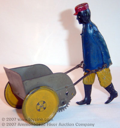 Black Americana porter tin toy
