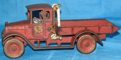 Kenton Jaeger cement mixer; Wilkens cast iron paddle wheeler; Arcade Fageol bus; Metalcraft vintage Heinz delivery truck.