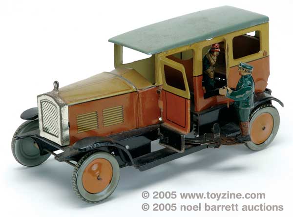 Hans Eberl clockwork tin car is an amazement. After proceeding apace, the car stops and the chauffeur