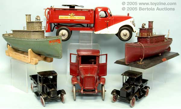 Pressed Steel Trucks from all the famous makers line the walls and showcases and promise to deliver the goods in April