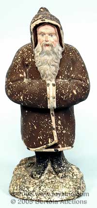 Belsnickle composition candy container cradled