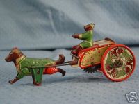 STOCK GERMAN LITHOGRAPH TIN WINDUP MONKEY DRIVING CART