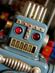 Smoking Spaceman tin toy robot