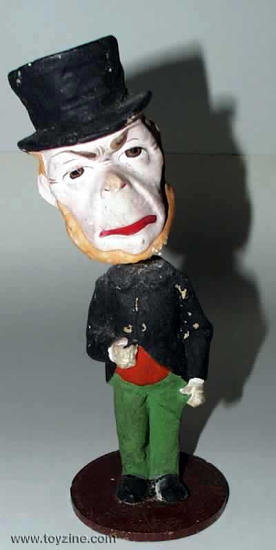 ABRAHAM LINCOLN - NODDER DOLL - early composition doll on wooden